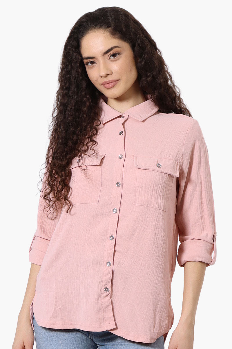 Chemise boutonnée à manches retroussables de la société International INC - Rose